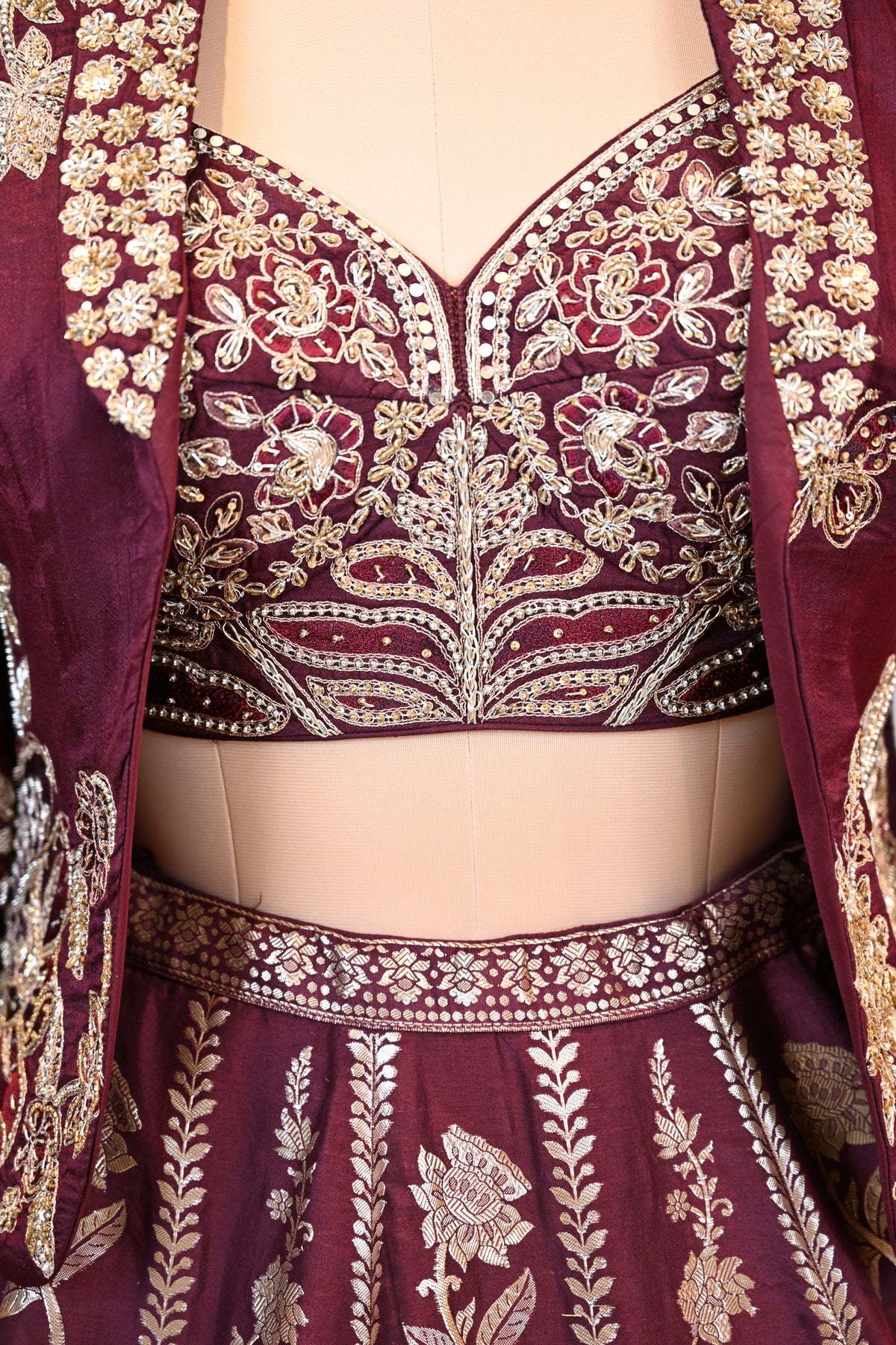 Royal Maroon Lehenga Ensemble with Intricate Floral Embroidery