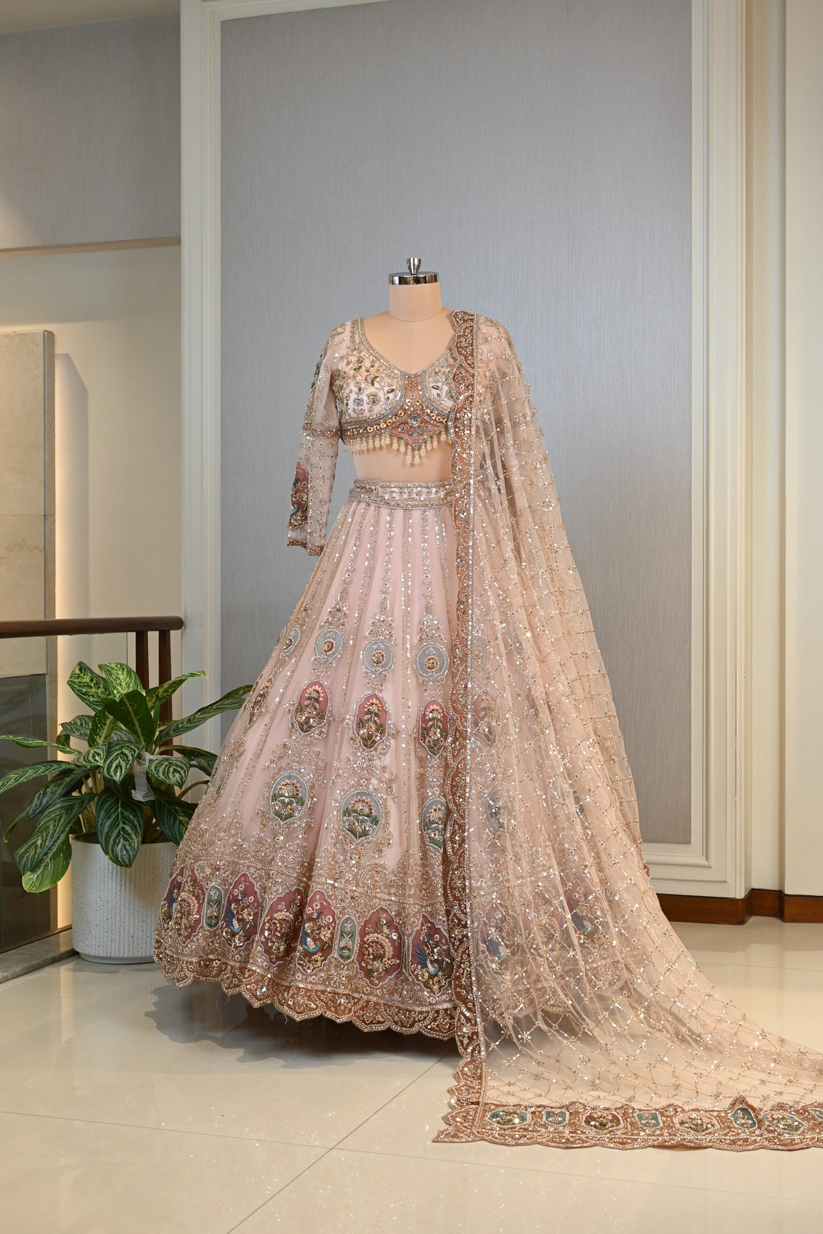 Elegant Powder Peach Lehenga Set crafted In Delicate Net