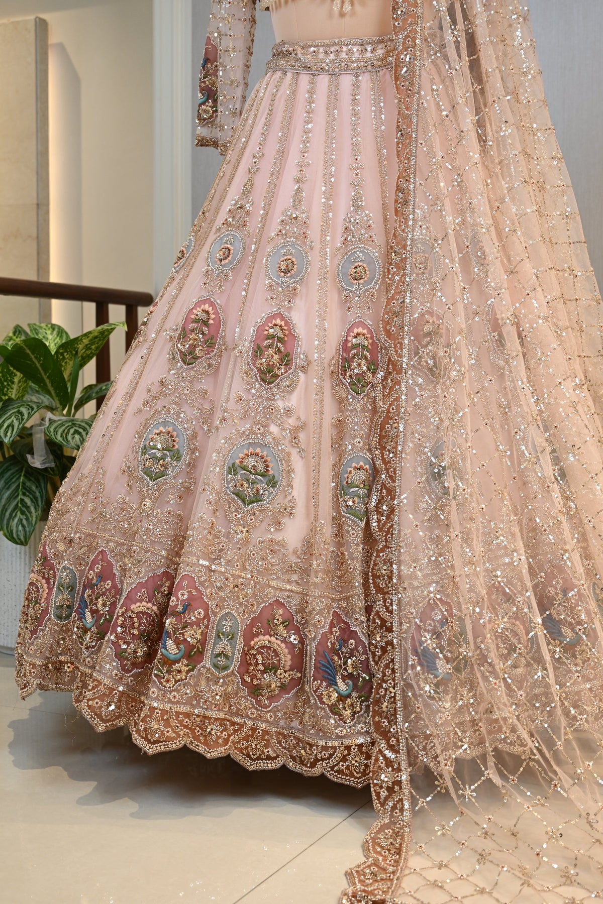 Elegant Powder Peach Lehenga Set crafted In Delicate Net